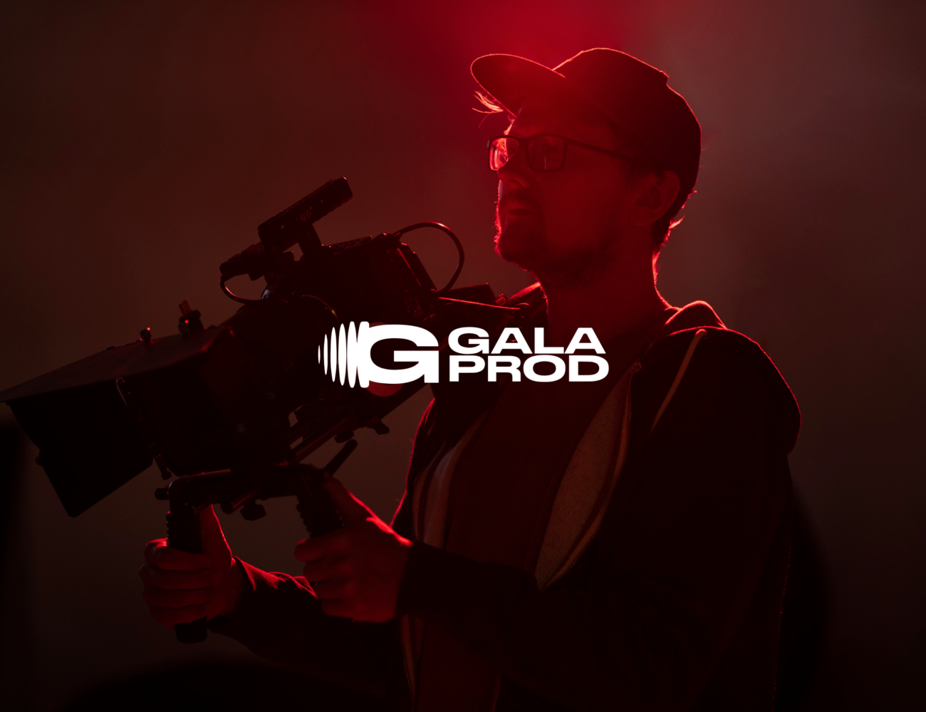 man-filming-with-professional-camera